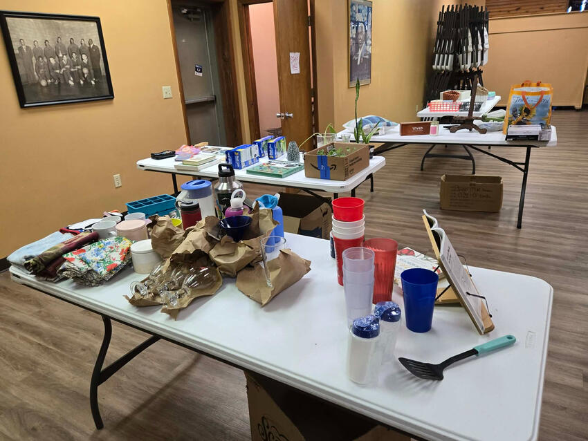 Tables of donations at our Household Good Swap & Cooking Demonstration event